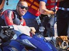Lewis Hamilton and Roscoe on jet ski ahead of Monaco Grand Prix