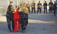 Obama limits drone strikes, steps to shut Guantanamo